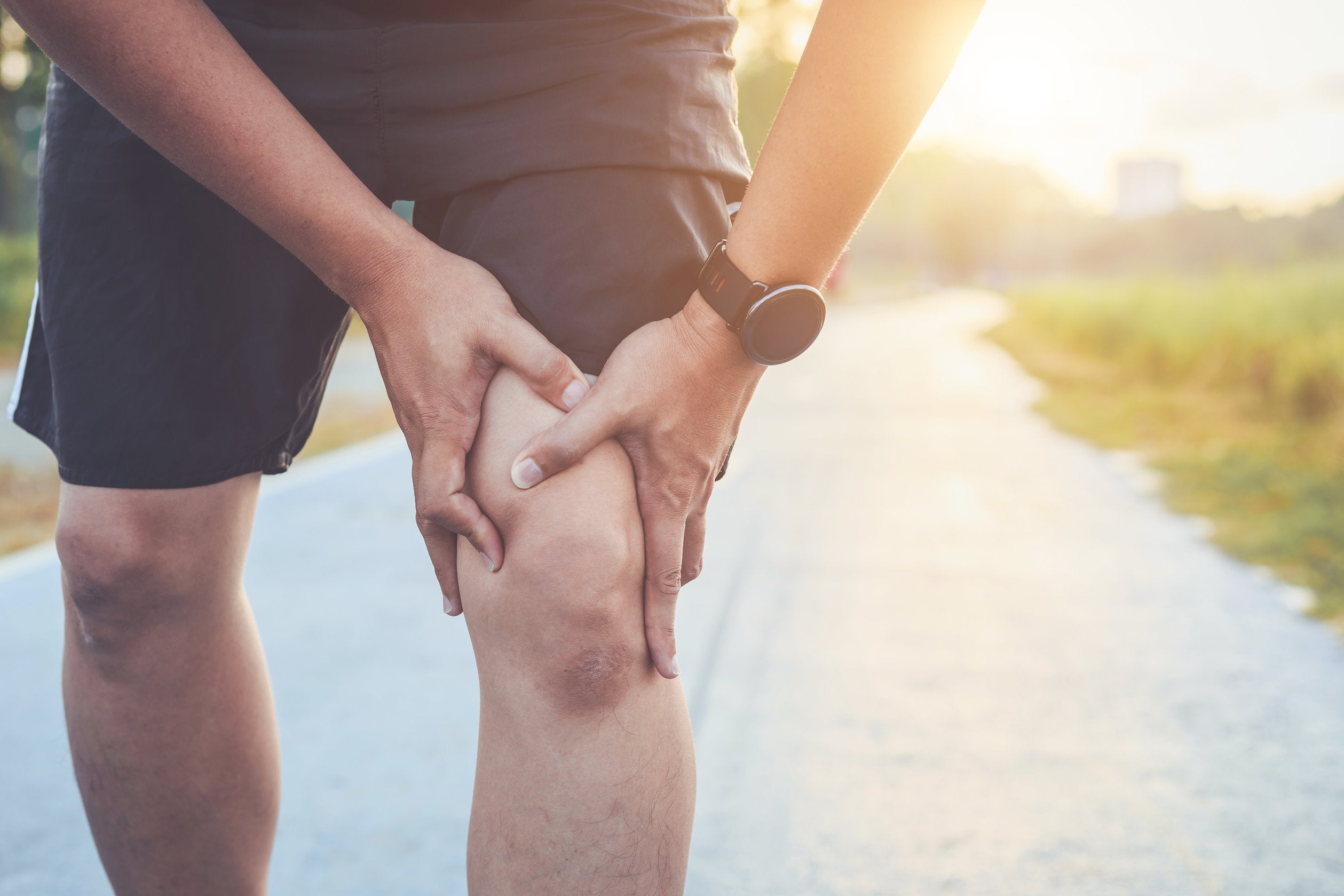 man with muscle strain in leg