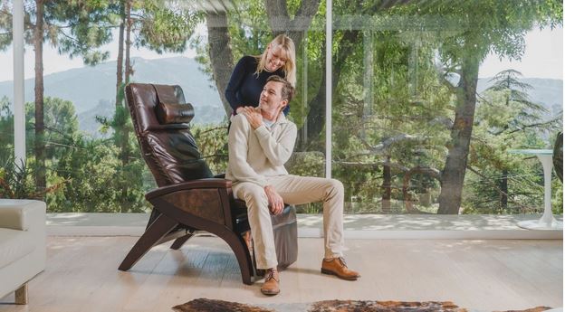 a couple on a zero gravity chair