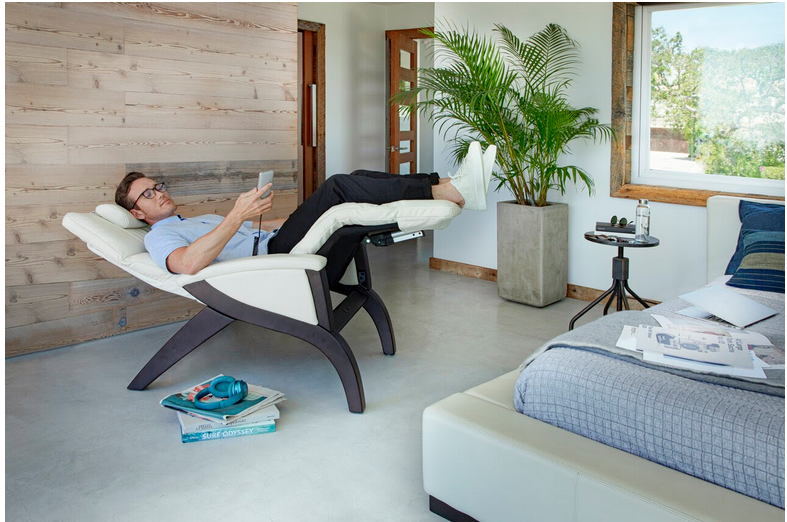  a man relaxing in a recliner
