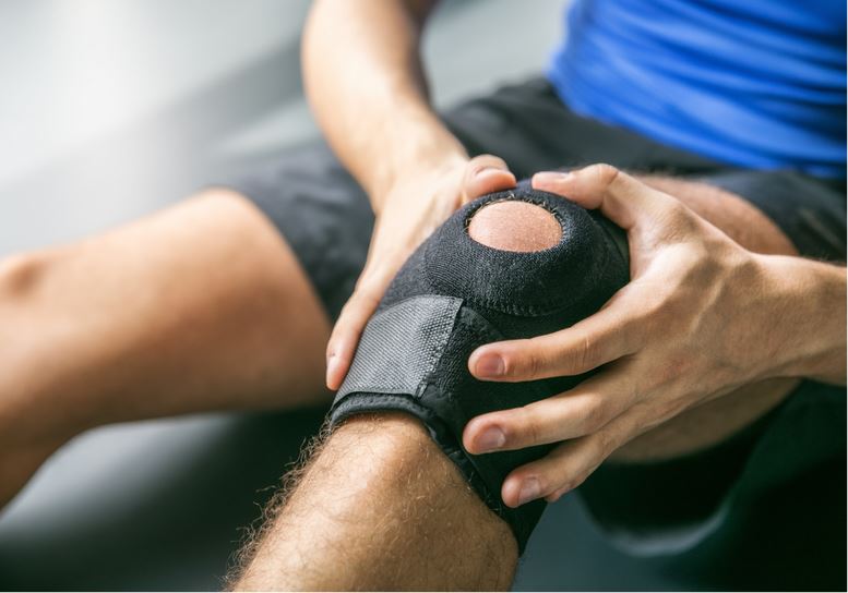  a man suffering from a knee injury