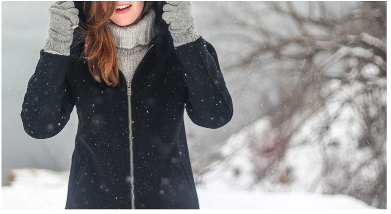 a woman wearing a winter coat