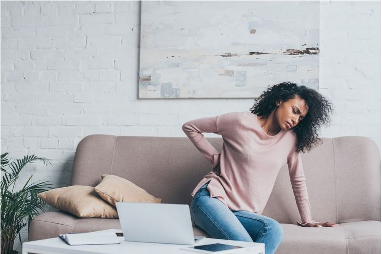 a woman with back pain