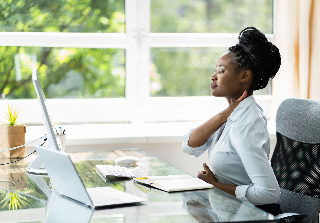 woman using an ergonomic chair for back pain 