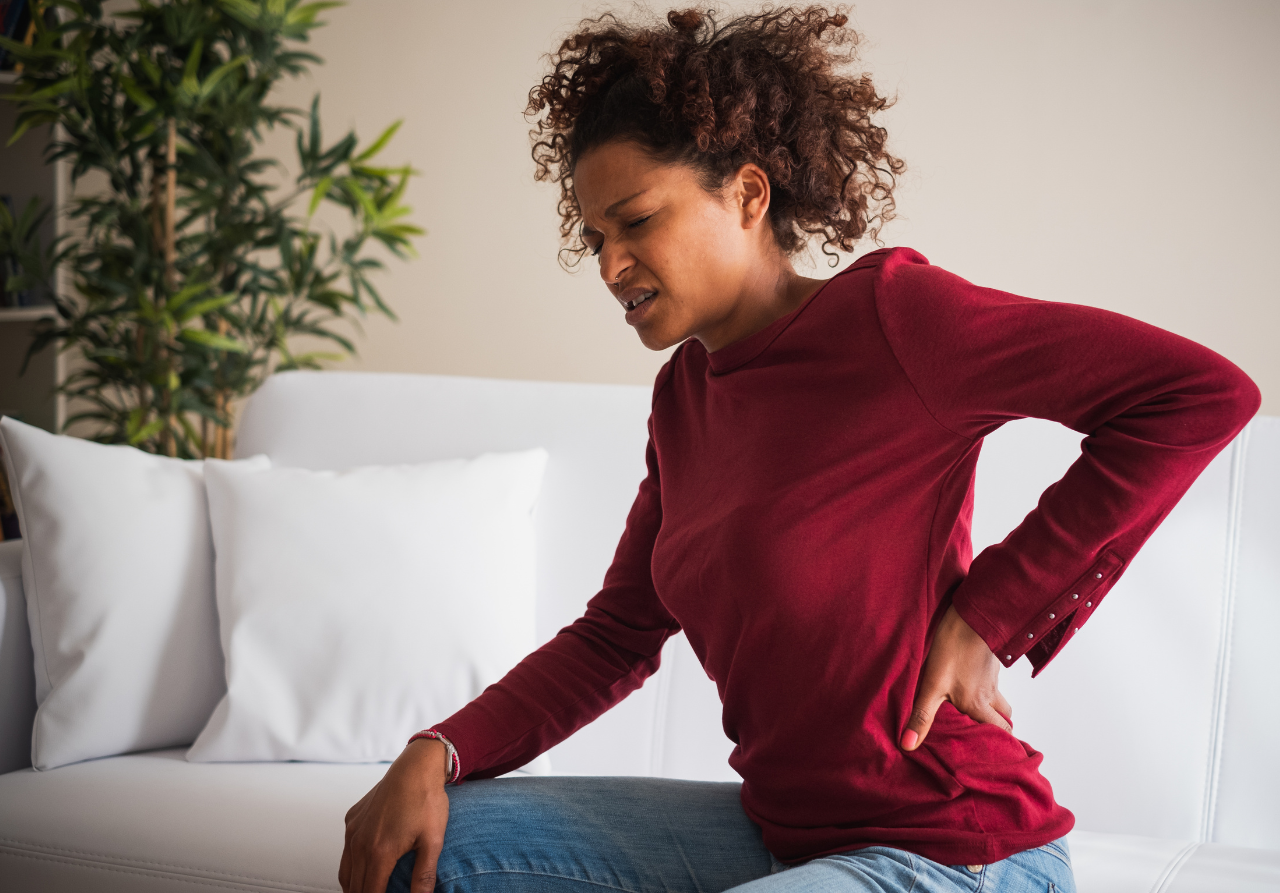 woman experiencing lower back pain