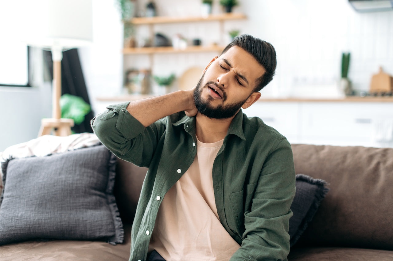 man-needing-pinched-nerve-treatment