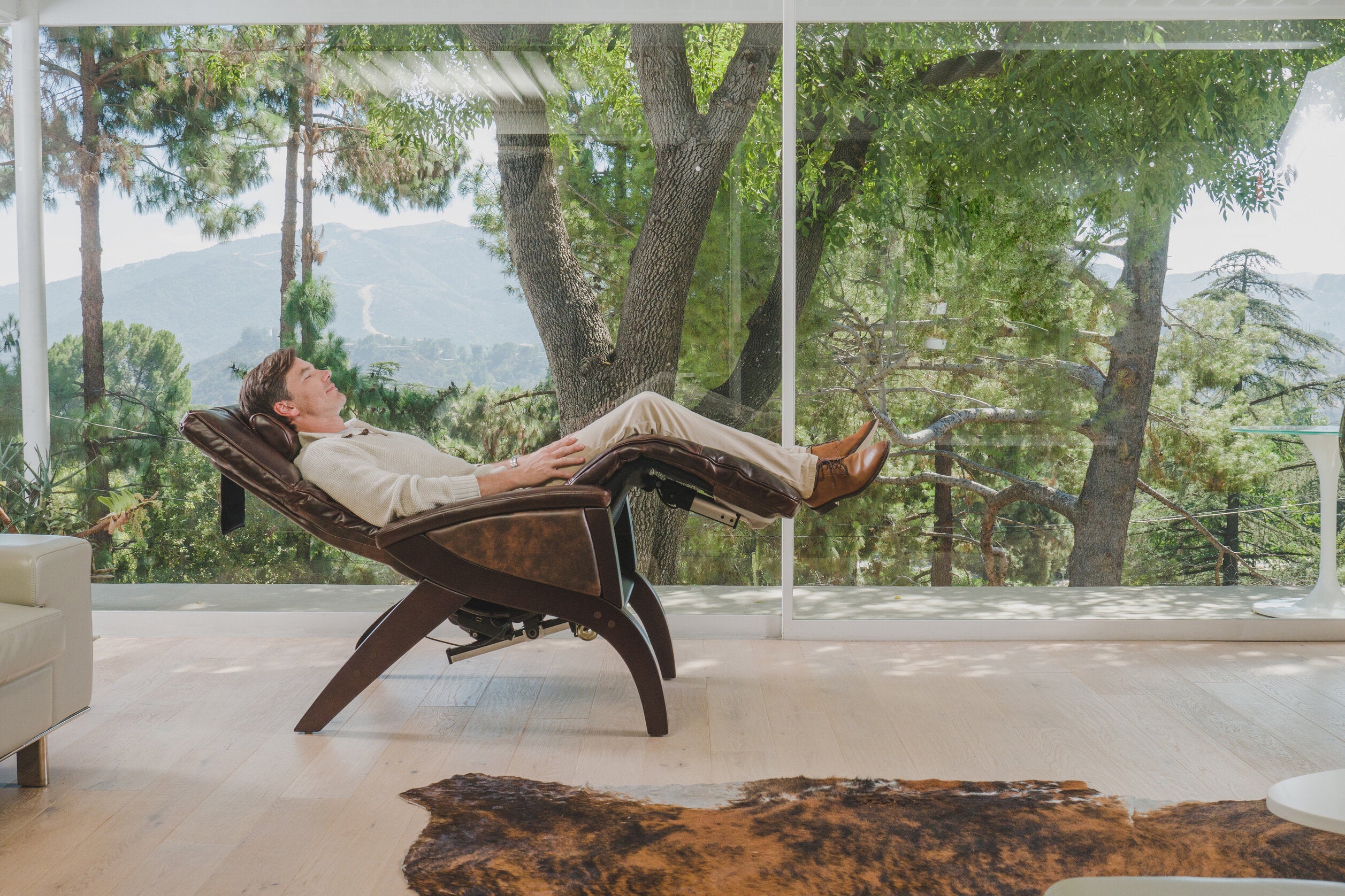 man relaxing in a zero gravity chair