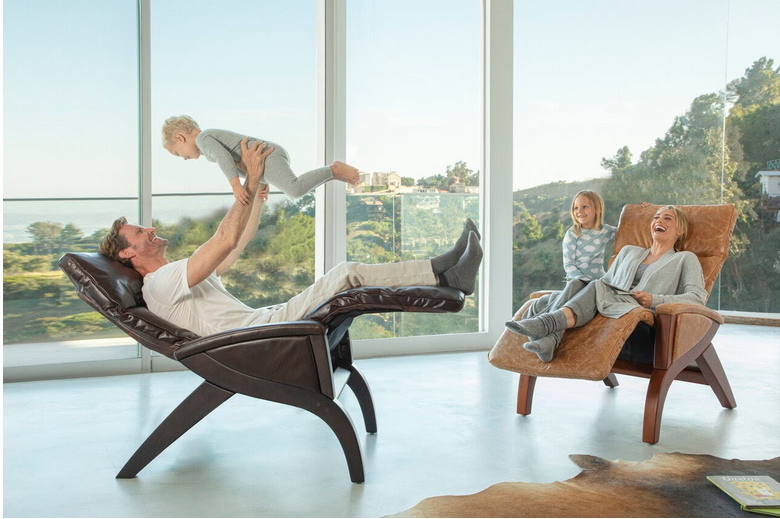 photo of a family sitting on zero gravity chairs