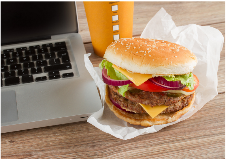 photo of a hamburger and large coke
