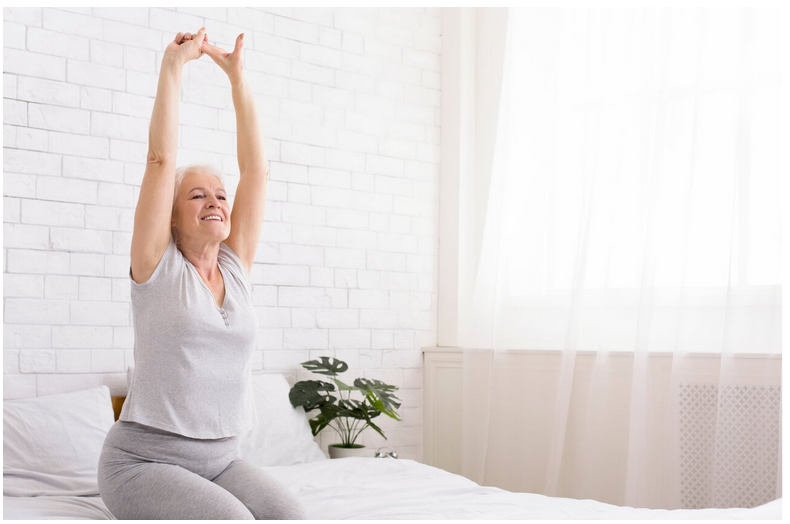 photo of a senior citizen doing some light stretching