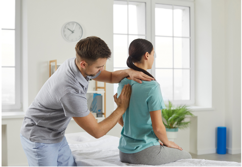 photo of a woman getting her spine checked