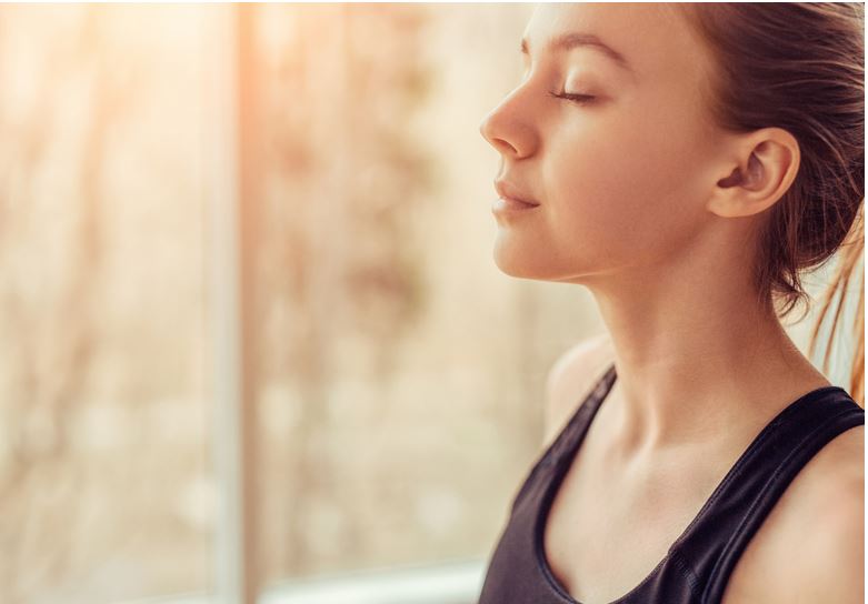 photo of a woman meditating