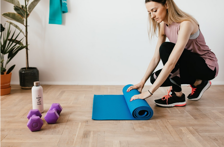 photo of a woman working out at home