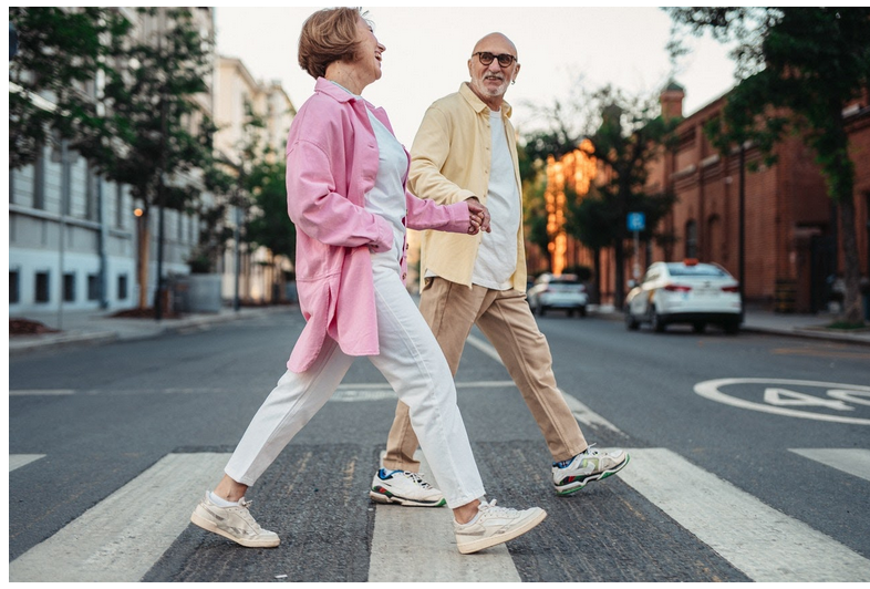 two senior citizens taking a relaxing walk