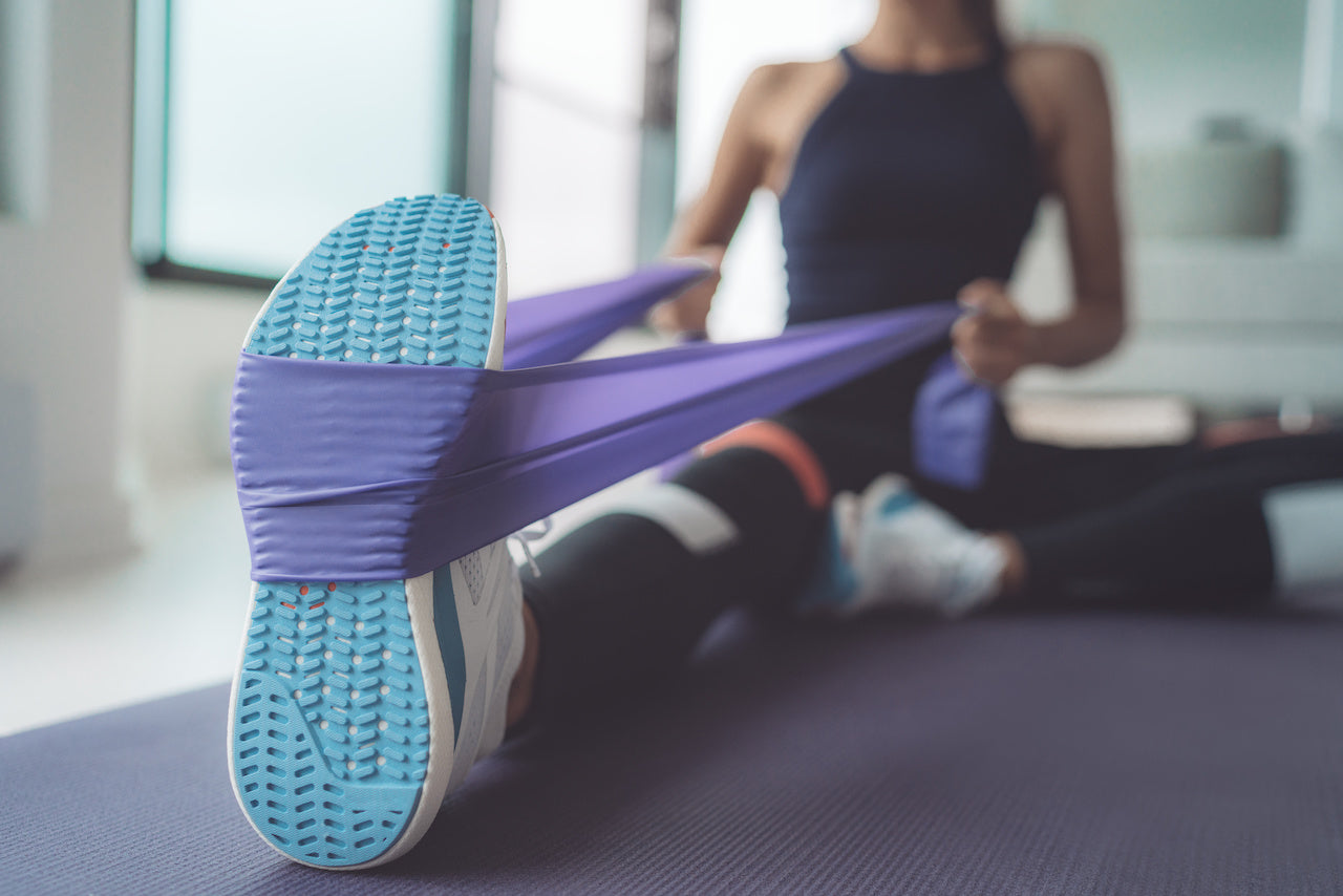 woman doing physical therapy at home