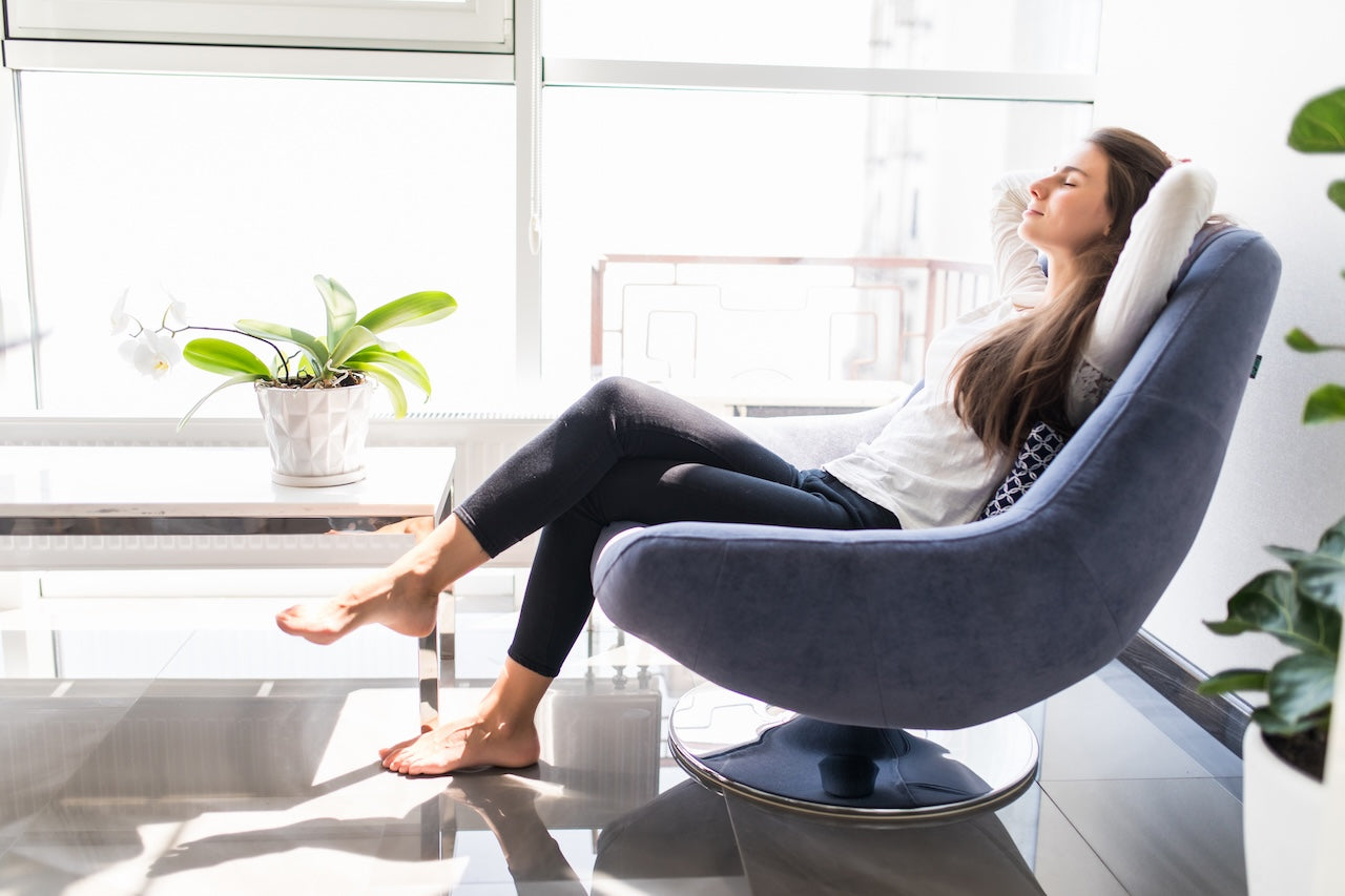 woman sitting in best recliners for lumbar support