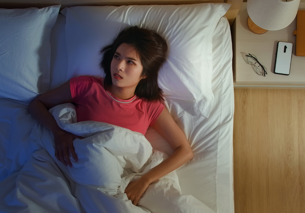 woman fighting summer insomnia