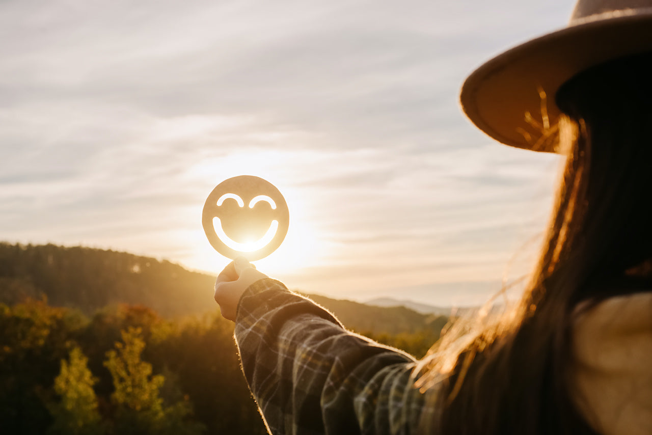 woman showing how to boost your mood