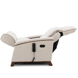 A cream-colored electric recliner chair with its footrest extended, featuring a black remote control hanging from the side and a dark wood base, shown against a solid white background.