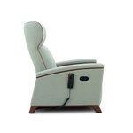 A light sage green upholstered recliner chair with brown wooden legs, featuring a side-mounted remote control and power outlet, shown from a side profile on a white background.