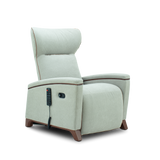 A light sage green upholstered recliner chair with dark brown wooden legs and a black remote control attached to the side, shown against a plain white background.