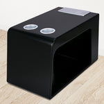 side view of black Svago zero gravity side table with cup holders and closed USB charging station